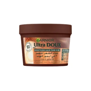 Garnier Ultra Doux Coconut and Macademia hair mask, a 98% natural origin formula supercharged with vitamins C, E, and F for smooth, frizz-free hair.