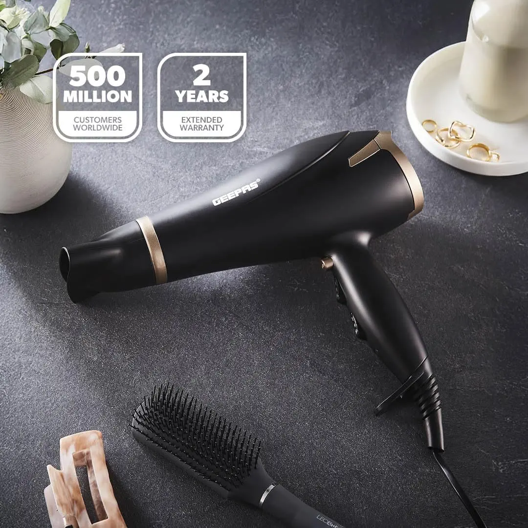 The Geepas 2200W hair dryer with ionic technology features two-speed and three-temperature settings, a cool shot function, and a detachable cap for easy cleaning.