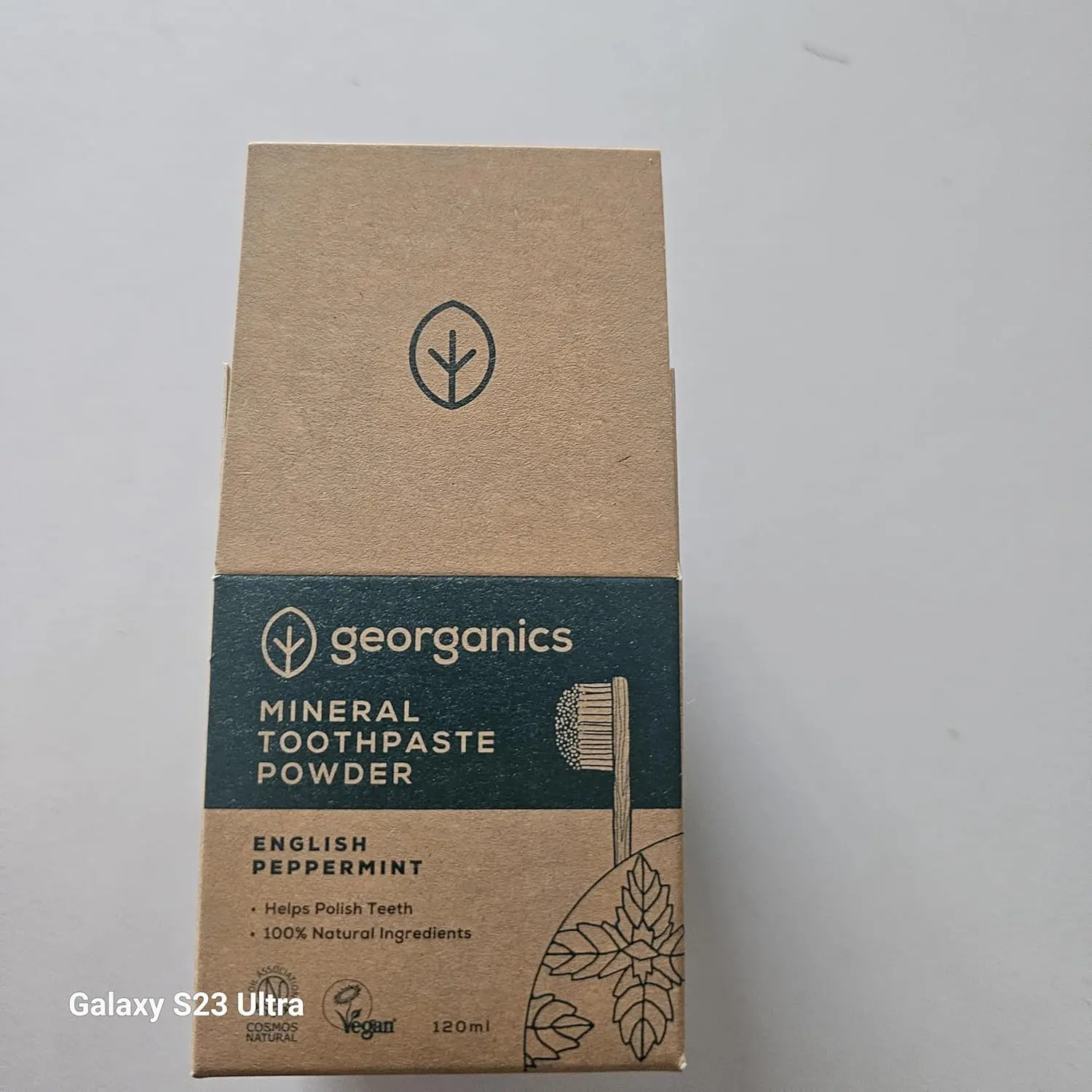 Georganics natural toothpowder in a glass jar, a vegan and cruelty-free stain-removing formula handmade in the UK.
