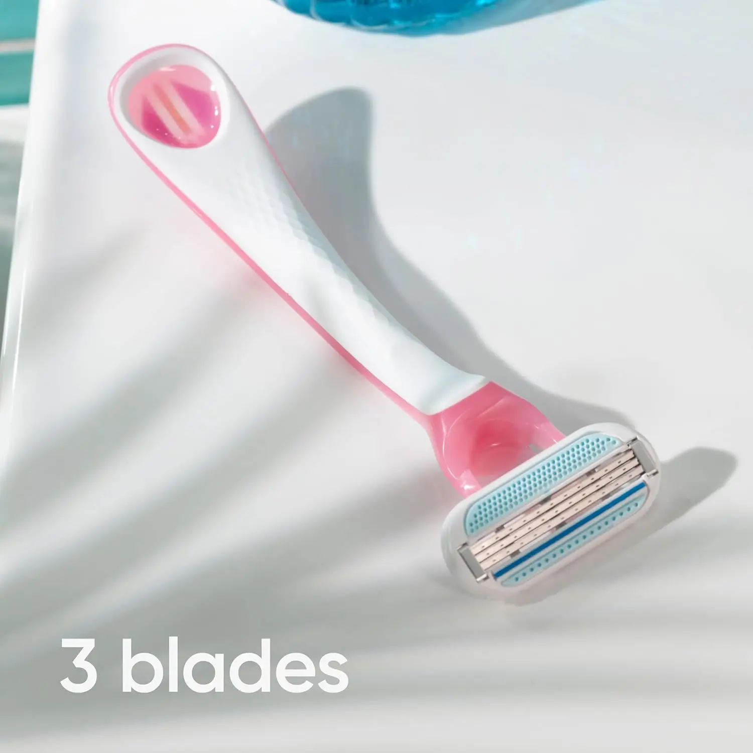 A pack of Gillette Venus Sensitive disposable razors with skin elixir lubrastrip and three curve-hugging blades for a smooth, comfortable shave, ideal for sensitive skin.