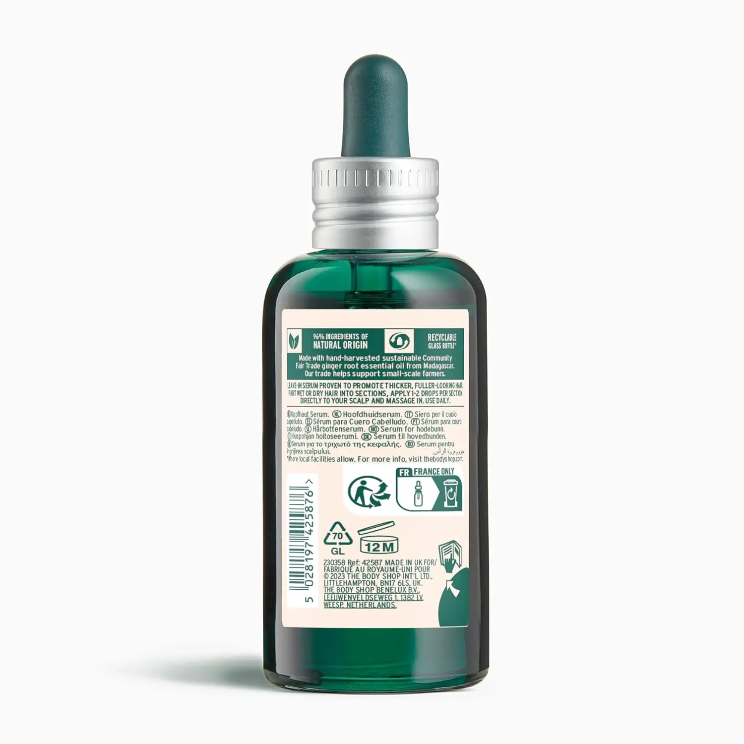 A bottle of ginger scalp serum designed to calm and nourish dry, flaky scalps while invigorating the senses with a refreshing ginger scent.