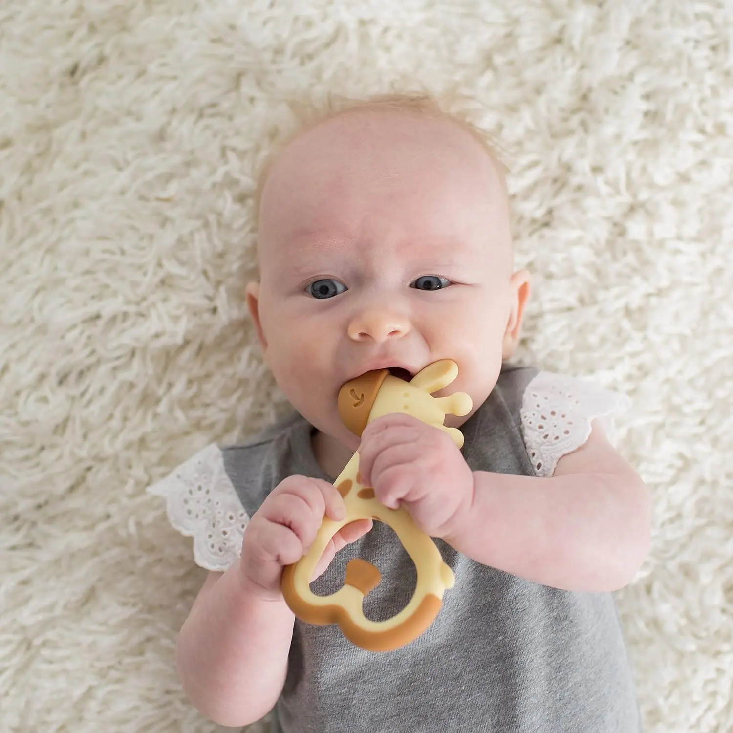 Dr. Brown's Ridgees giraffe teether provides a soothing massage to relieve baby's teething pain with its textured design and can be cooled for extra comfort.