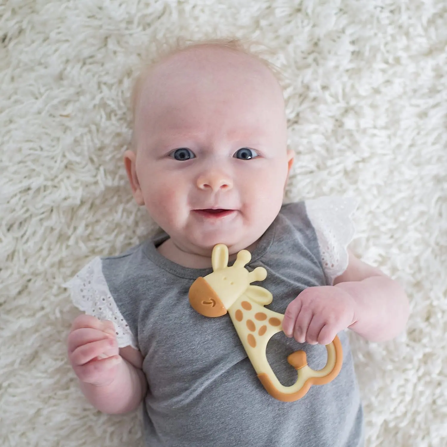 Dr. Brown's Ridgees giraffe teether provides a soothing massage to relieve baby's teething pain with its textured design and can be cooled for extra comfort.