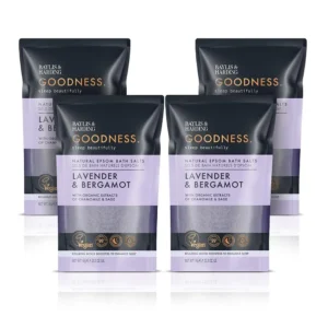 Four packs of Baylis & Harding Goodness Sleep bath salts, a vegan-friendly Epsom salt blend with essential oils and organic extracts designed to relax muscles and enhance sleep.