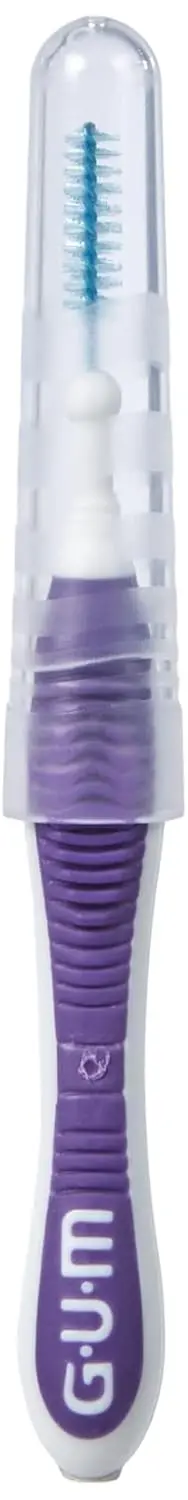 A pack of six purple Gum Trav-Ler interdental brushes designed for effective plaque removal with an ergonomic handle and antibacterial bristles.