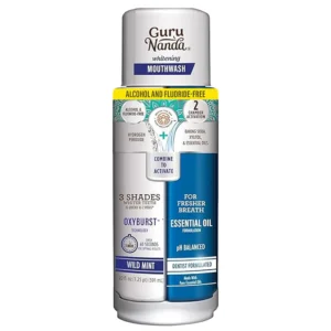 GuruNanda dual barrel whitening mouthwash promotes teeth whitening and healthy gums with natural essential oils, offering a refreshing wild mint flavor and alcohol & fluoride-free formula.