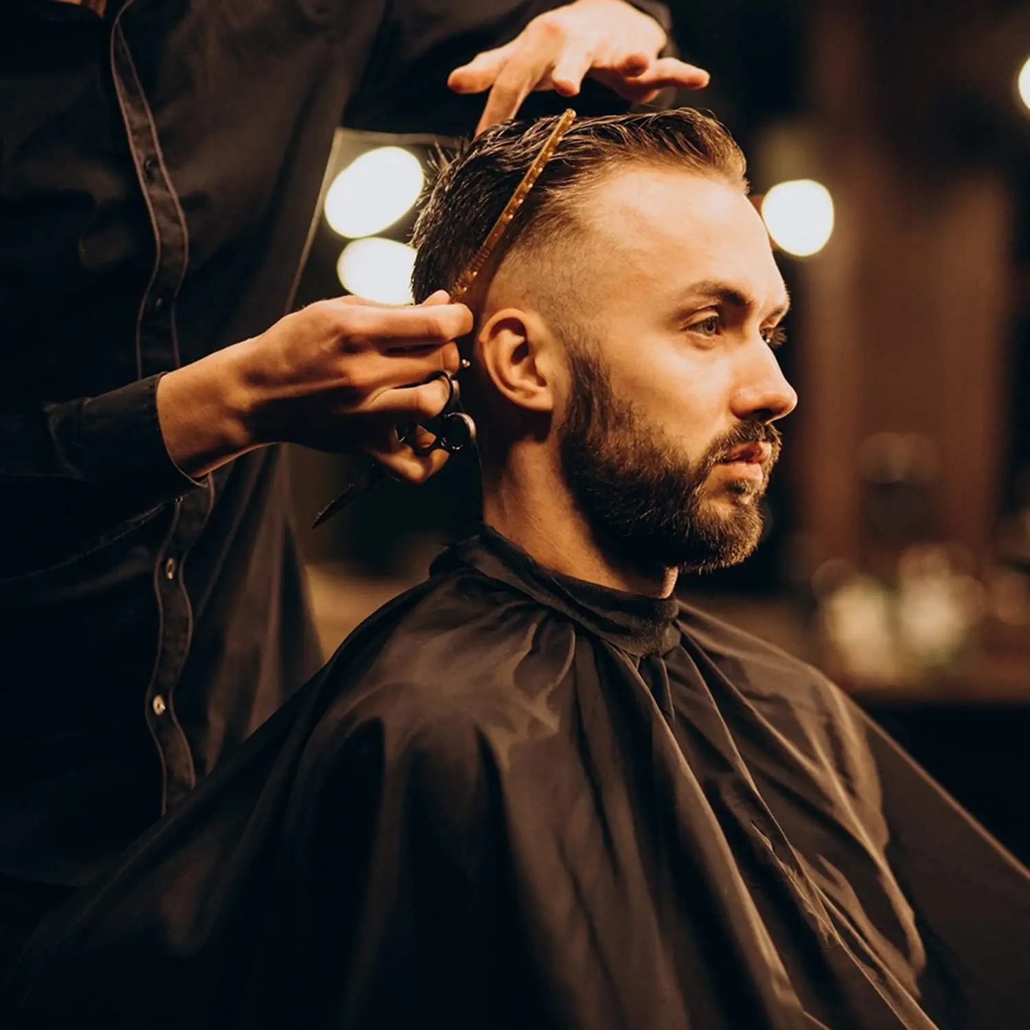 This 11-piece professional hair cutting kit includes stainless steel barber scissors, thinning shears, a straight edge razor, and other essential hairdressing tools for a salon-quality haircut at home.