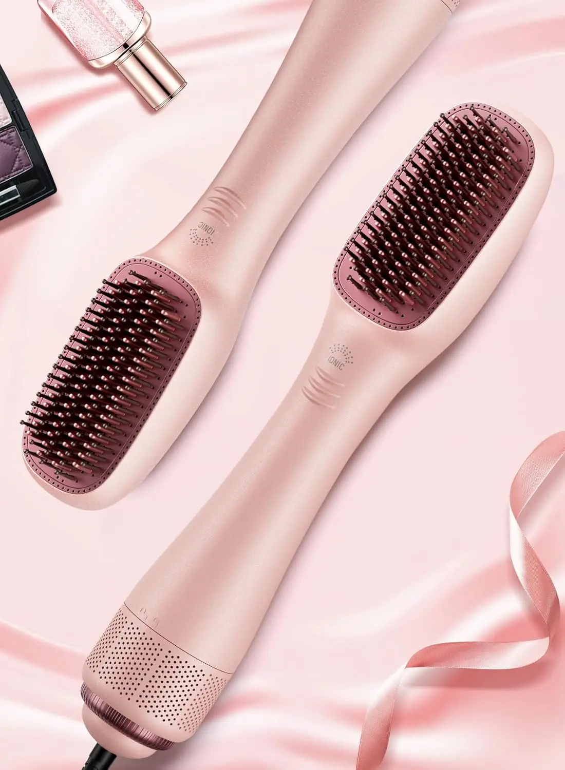 This pink 3-in-1 hair dryer brush and straightener combines a hair dryer, straightener, and hot comb with ionic technology for smooth, shiny, and healthy hair.
