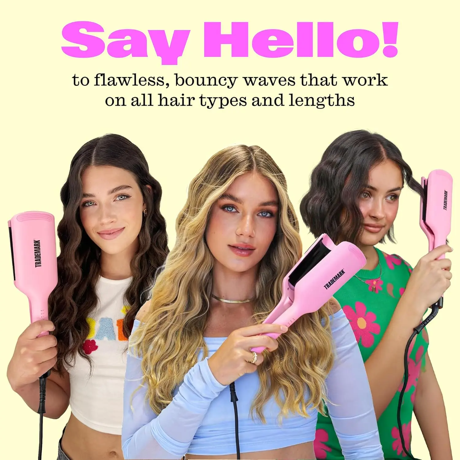 Pink double barrel hair waver creating effortless beach waves with adjustable temperature and tourmaline ceramic plates for shiny, frizz-free hair.