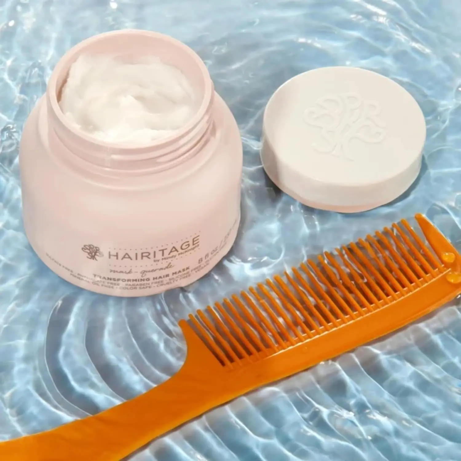 Hairitage argan oil hair mask is a deep conditioner and curl repair treatment made with shea butter and aloe, perfect for hydrating dry and damaged hair.