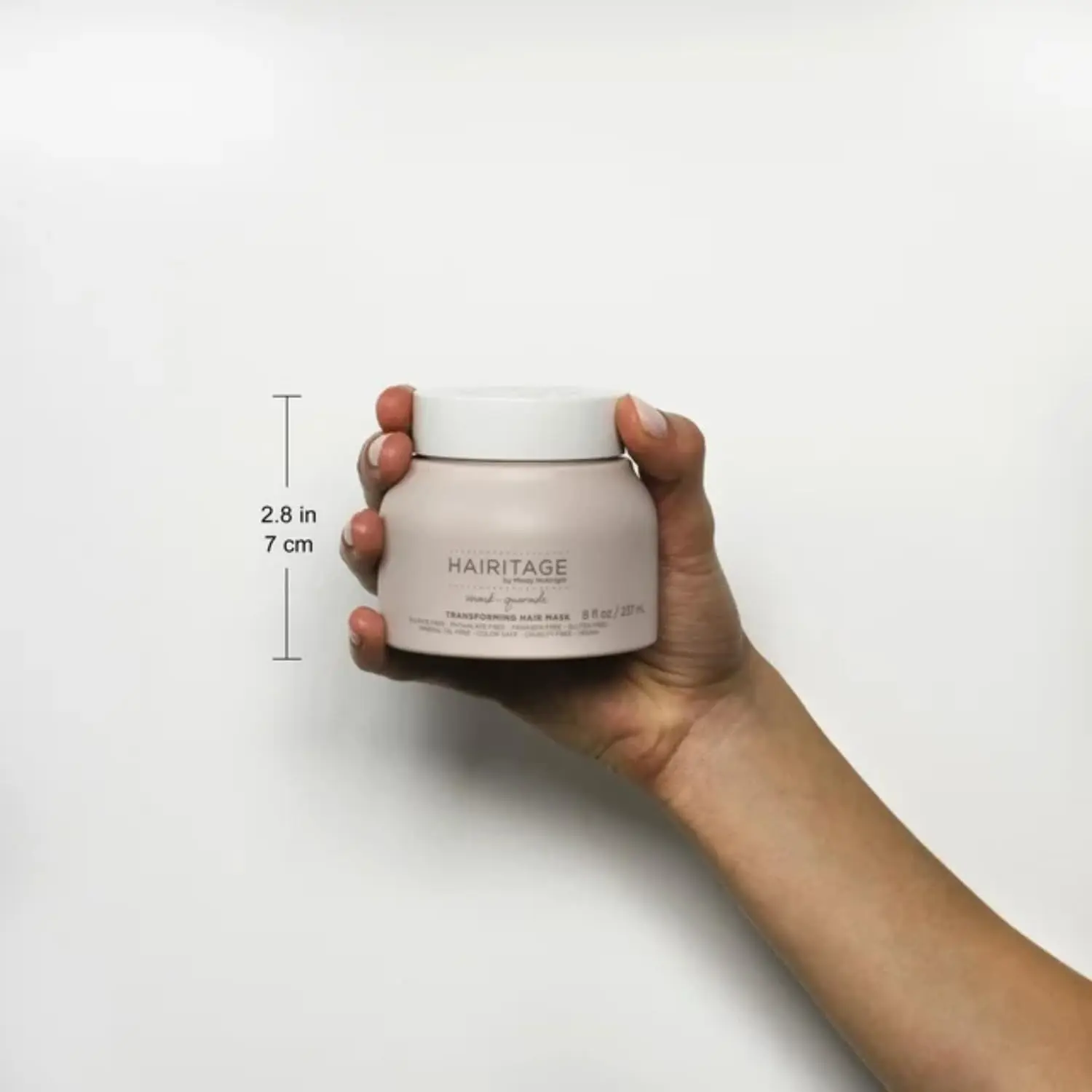 Hairitage argan oil hair mask is a deep conditioner and curl repair treatment made with shea butter and aloe, perfect for hydrating dry and damaged hair.