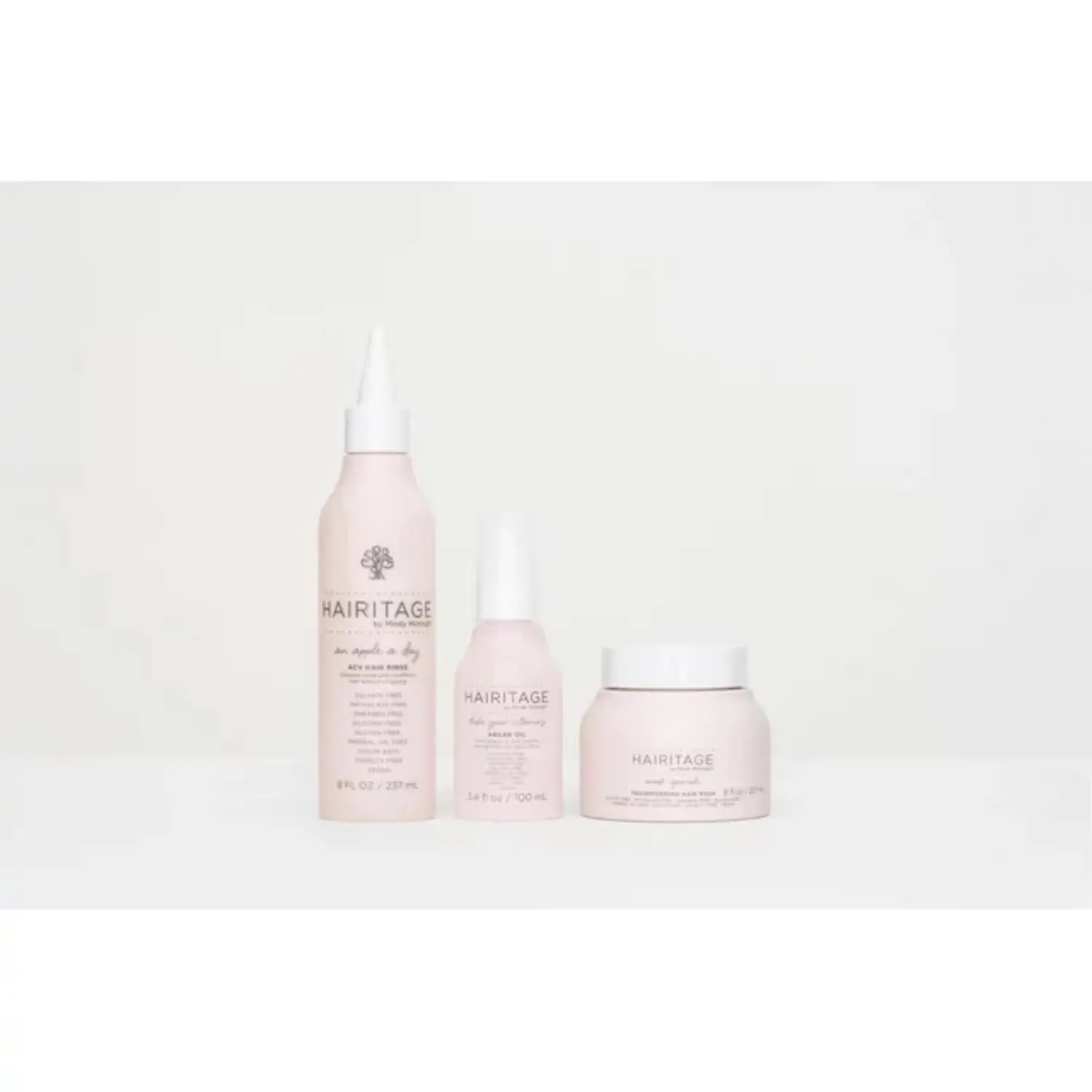 Hairitage argan oil hair mask is a deep conditioner and curl repair treatment made with shea butter and aloe, perfect for hydrating dry and damaged hair.