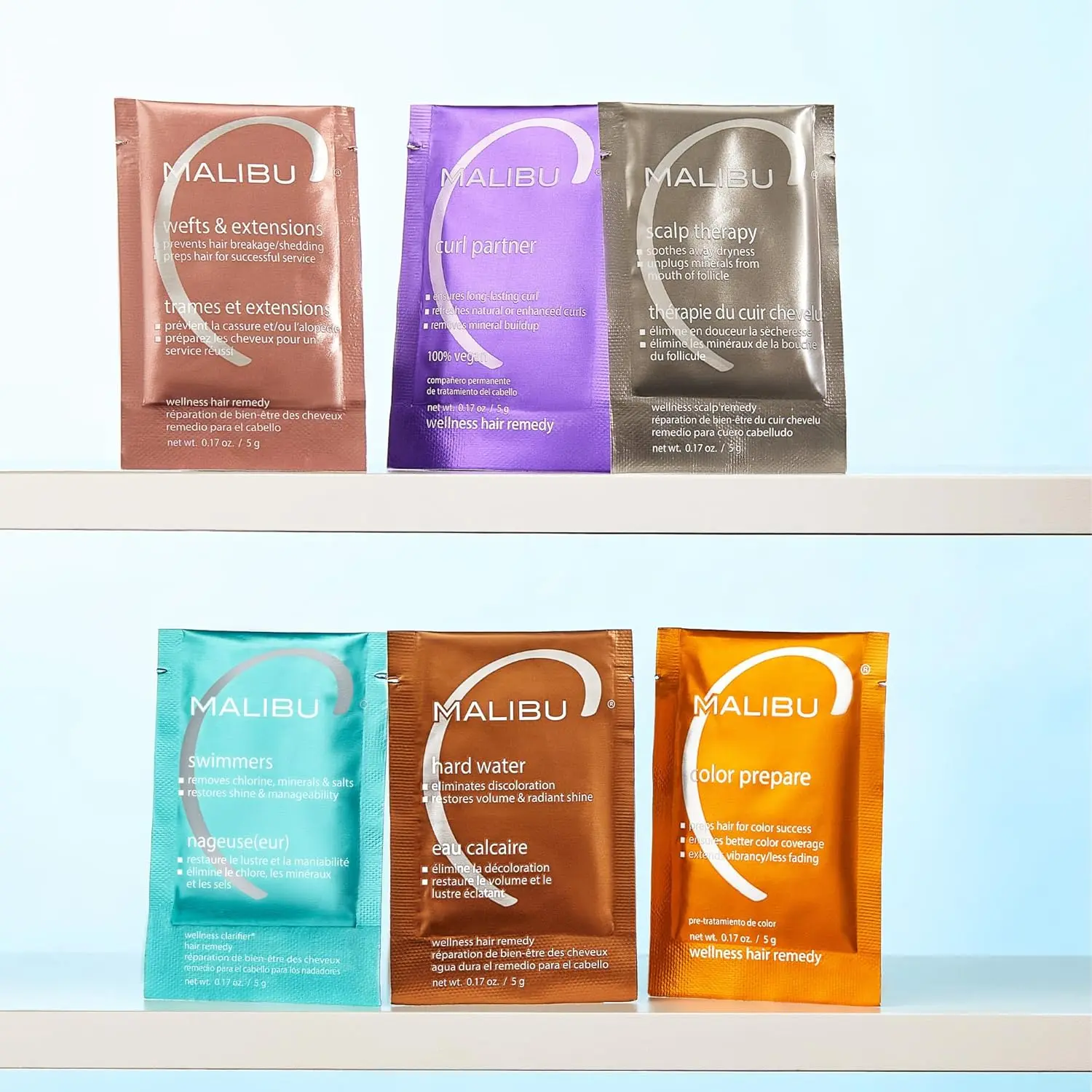 Malibu C Hard Water Wellness Hair Remedy removes hard water deposits and impurities, eliminating brassiness and discoloration for healthier, shinier, and more vibrant hair.