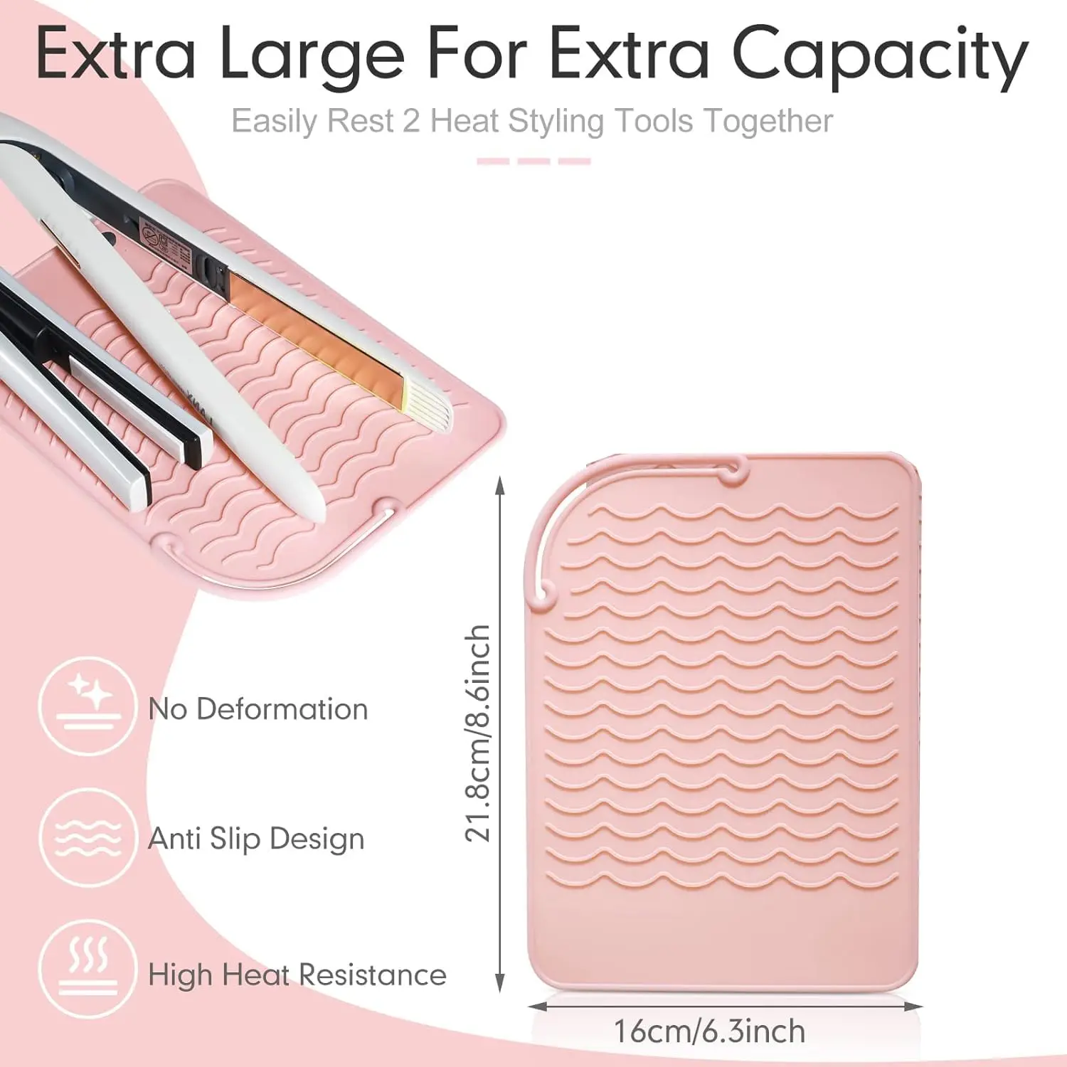 Pink silicone heat resistant mat safely holds hot curling iron and hair straightener, protecting surfaces from heat damage with its non-slip wave design and convenient hanging strap.