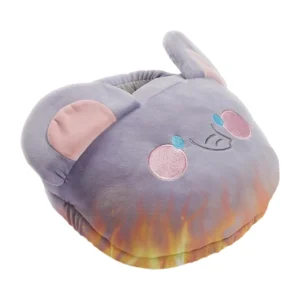 Cartoon shoe-shaped heated foot warmer providing comfortable and safe warmth under a desk in an office setting, powered by USB for energy-efficient use.