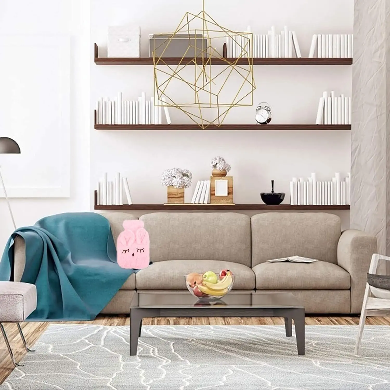 Pink hot water bottle with a detachable plush rabbit cover provides soothing warmth for pain relief from cramps, arthritis, aches, and injuries, also usable as a cold compress.