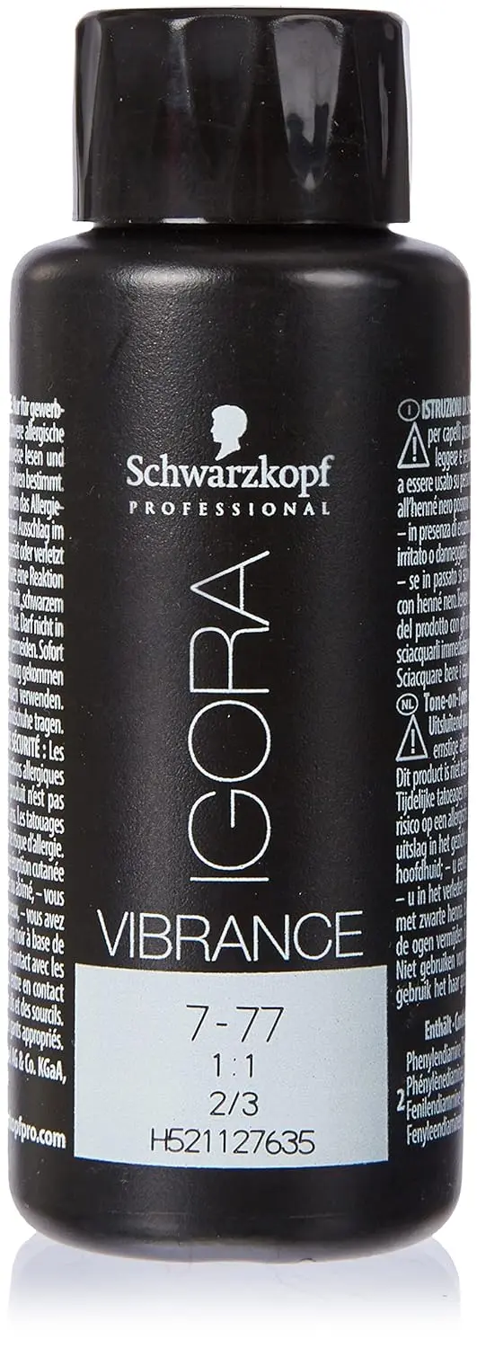 A tube of Schwarzkopf Igora Royal light brown permanent hair color, offering 100% white hair coverage up to level 9 and designed for mixing.