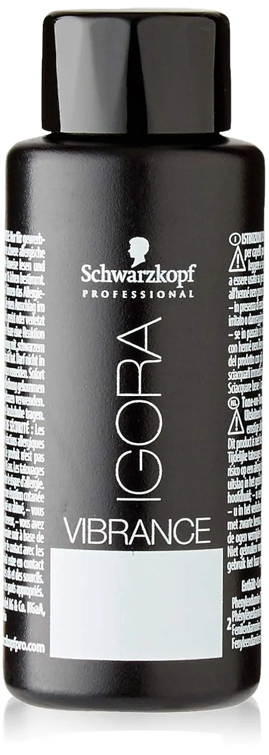 A tube of Schwarzkopf Igora Royal light brown permanent hair color, offering 100% white hair coverage up to level 9 and designed for mixing.