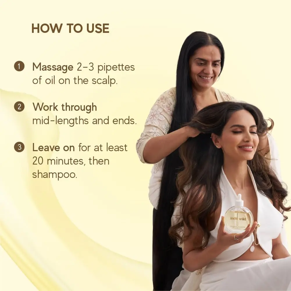 inde wild hair oil infused with Ayurvedic ingredients like Bhringraj, Brahmi, and Amla to strengthen hair, soothe the scalp, and promote healthy growth.