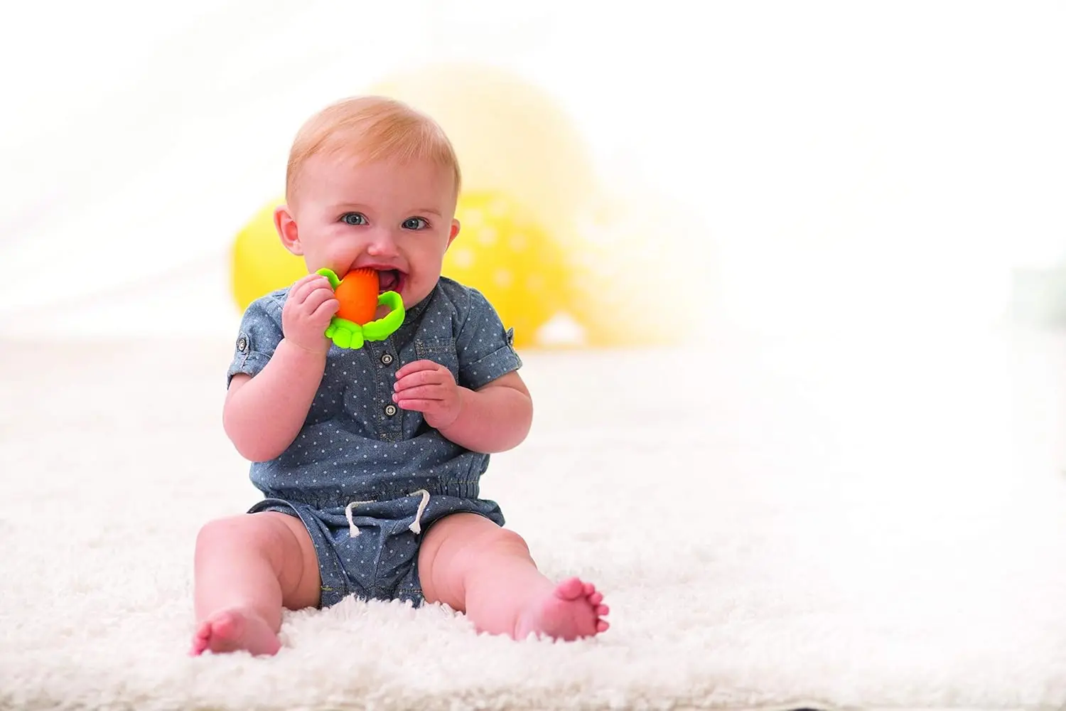 Infantino Good Bites carrot-shaped teether with two textured teething sides and an easy-to-grasp handle provides perfect teething relief for babies 0 months and up.