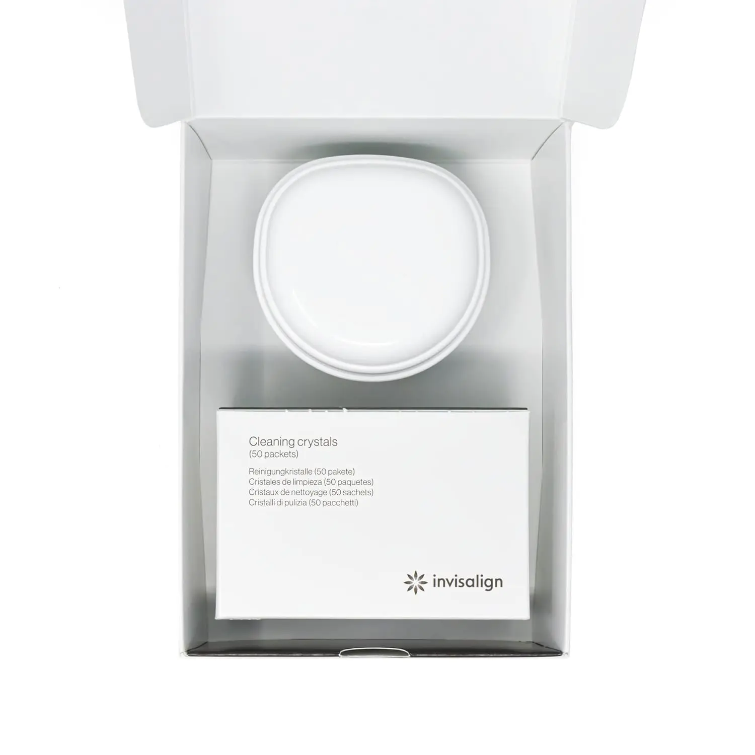 This kit includes 50 packets of Invisalign cleaning crystals and a cleaning tub to remove plaque and keep your aligners clear and hygienic in just 15 minutes.