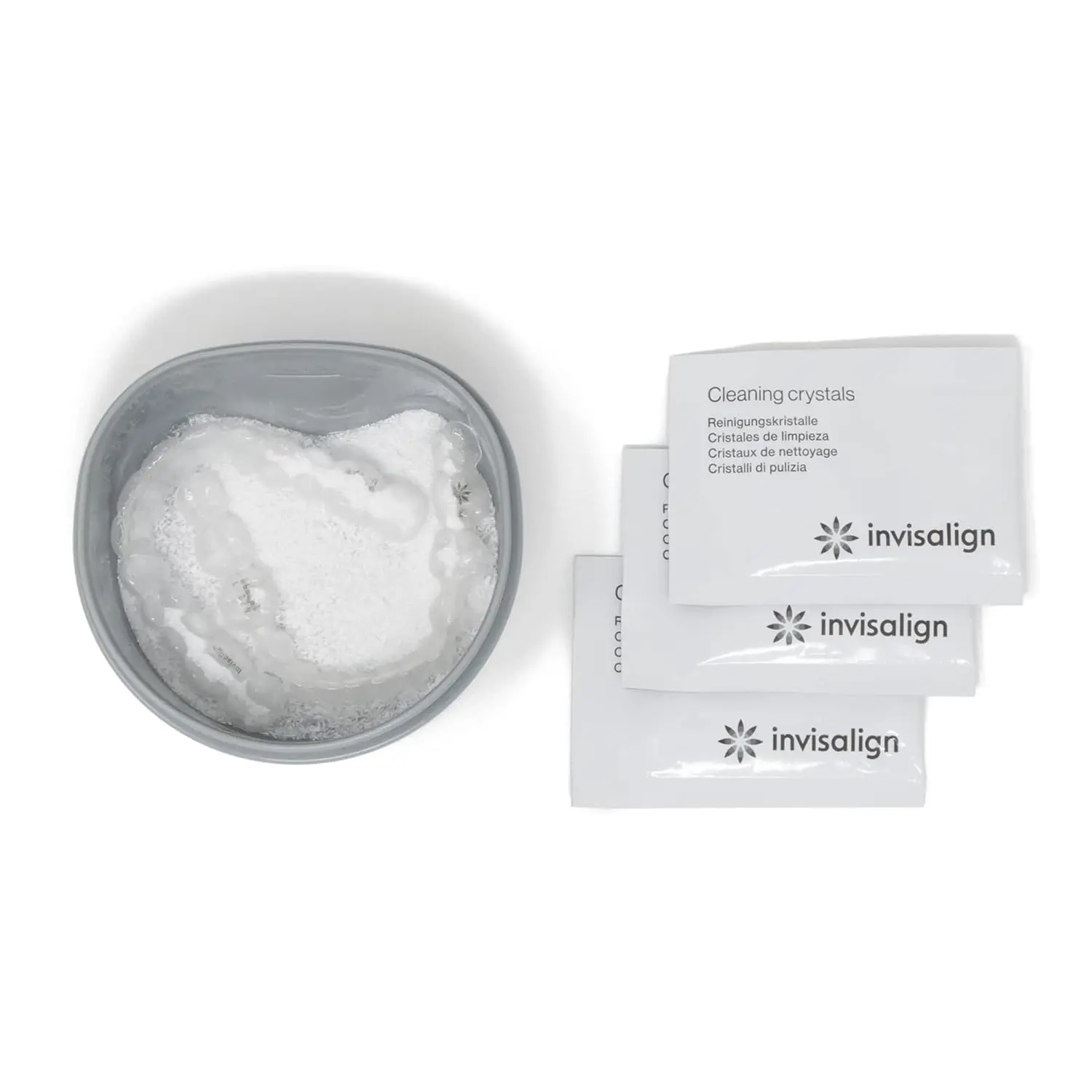 This kit includes 50 packets of Invisalign cleaning crystals and a cleaning tub to remove plaque and keep your aligners clear and hygienic in just 15 minutes.