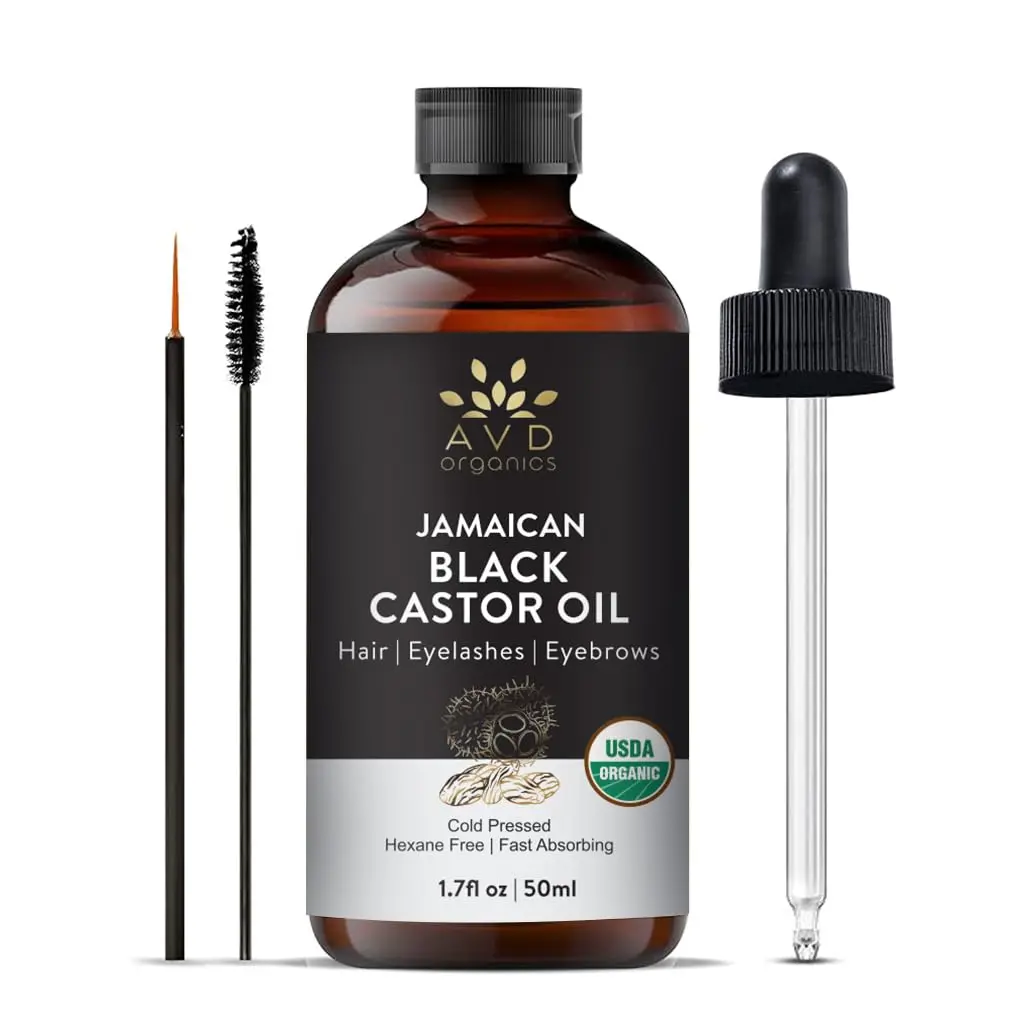 A bottle of AVD Organics Jamaican Black Castor Oil with dropper, ideal for promoting hair growth, moisturizing skin, and enhancing eyelashes and eyebrows.
