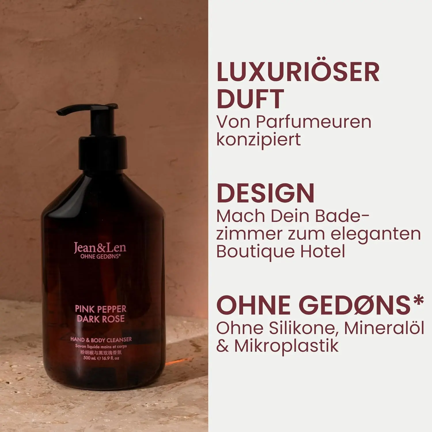 A bottle of Jean & Len Pink Pepper & Dark Rose hand and body cleanser, a vegan liquid soap with a sensual floral fragrance for a fragrant cleaning experience.