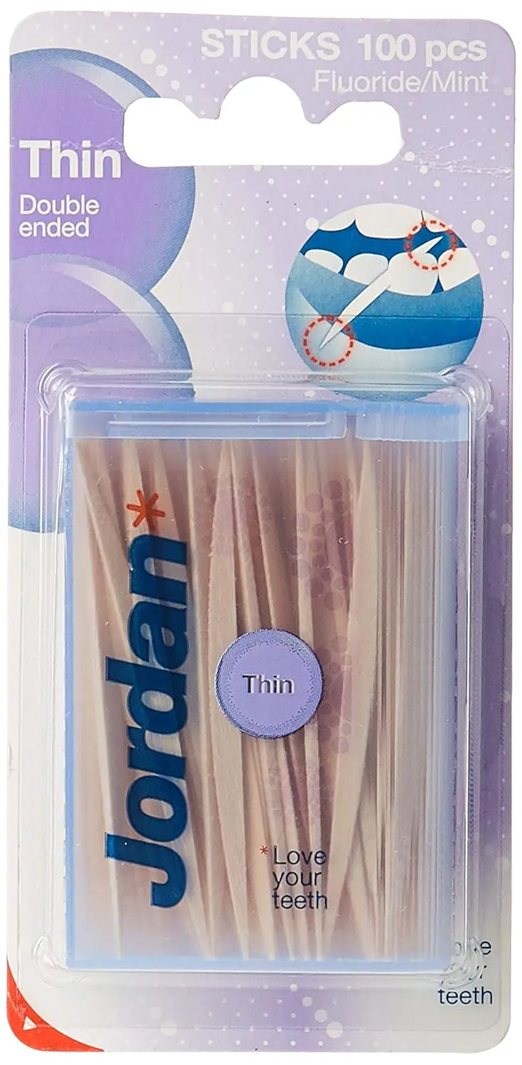 This image shows Jordan thin dental sticks made of Nordic birch, designed with wooden fibres and fluoride mint for an improved cleaning effect.