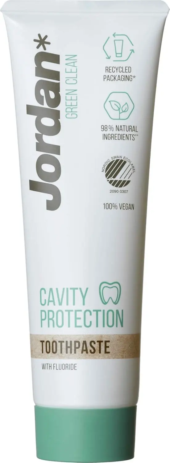 A tube of Jordan Green Clean cavity protection toothpaste, a vegan dental care product with 98% natural ingredients and recycled packaging.