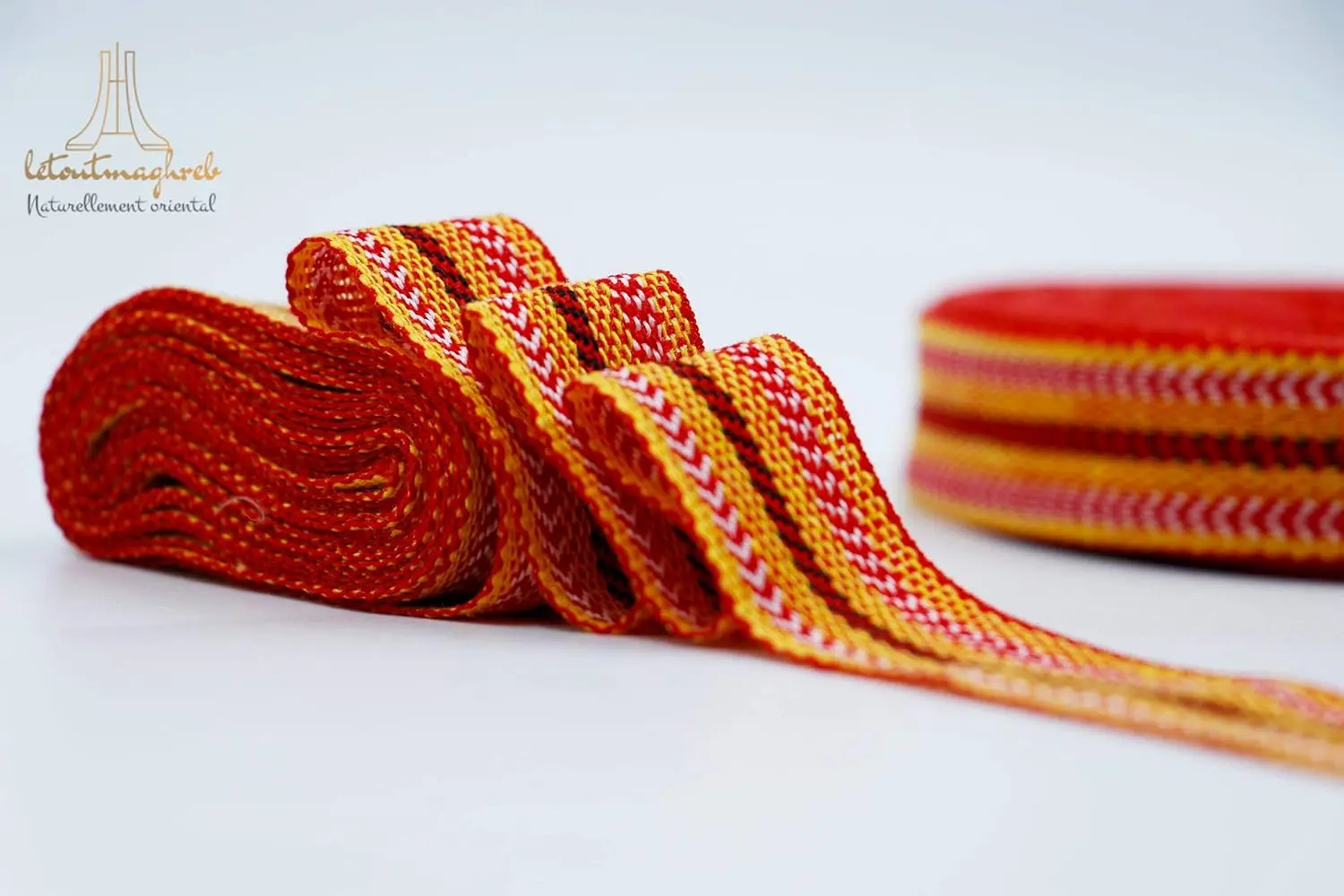 Two rolls of authentic Algerian Kardoune hair wrap, used for smoothing, repairing, and naturally softening hair, are displayed in this image.