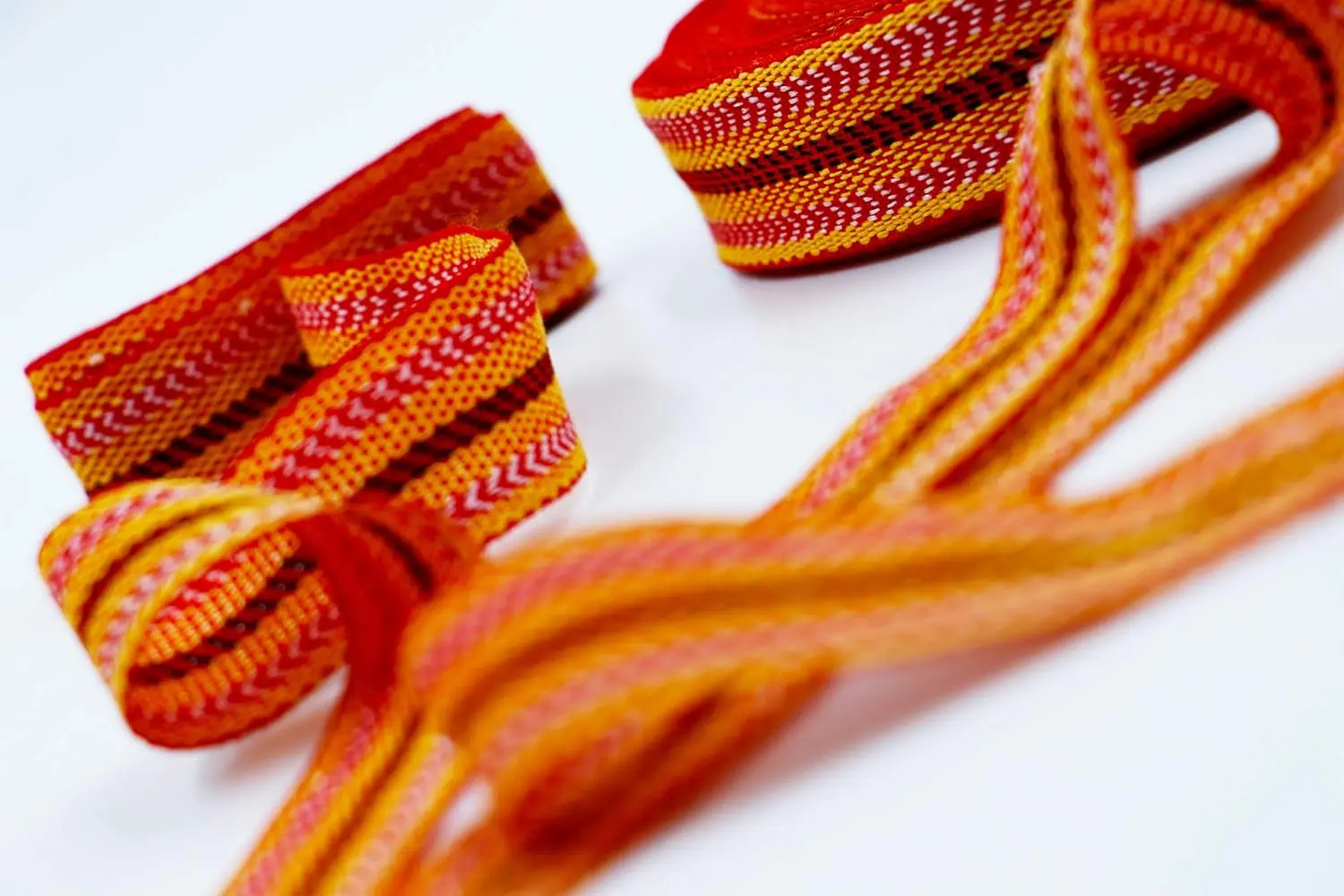 Two rolls of authentic Algerian Kardoune hair wrap, used for smoothing, repairing, and naturally softening hair, are displayed in this image.