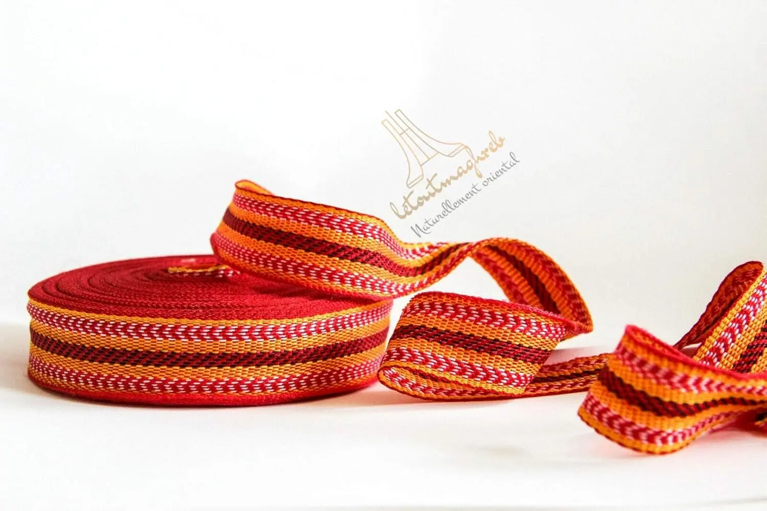 Two rolls of authentic Algerian Kardoune hair wrap, used for smoothing, repairing, and naturally softening hair, are displayed in this image.