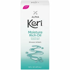 Five bottles of Keri Alpha Moisture Rich Oil, dermatologist recommended for smoothing and softening skin, made in the USA.