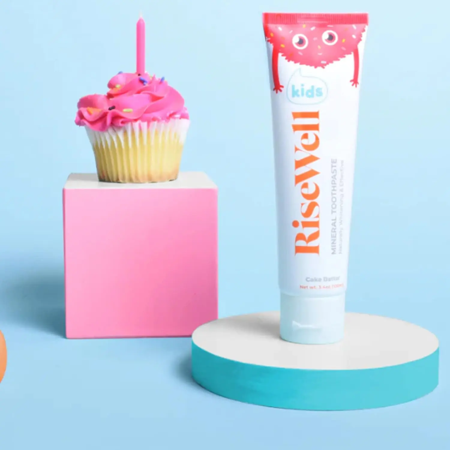 A tube of Risewell kids toothpaste with a cake batter scent is formulated with natural hydroxyapatite for gentle cleaning of children's sensitive teeth.