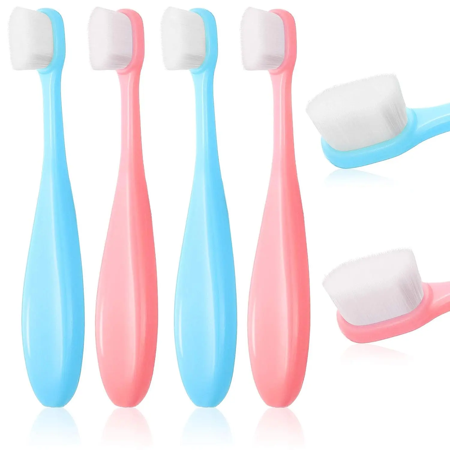Four extra soft nano toothbrushes in blue and pink colors designed for toddlers and children for gentle and effective teeth cleaning.