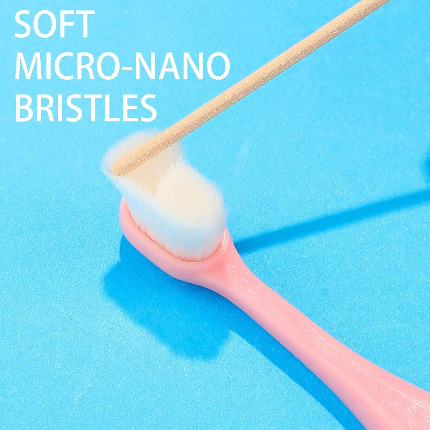 Four extra soft nano toothbrushes in blue and pink colors designed for toddlers and children for gentle and effective teeth cleaning.