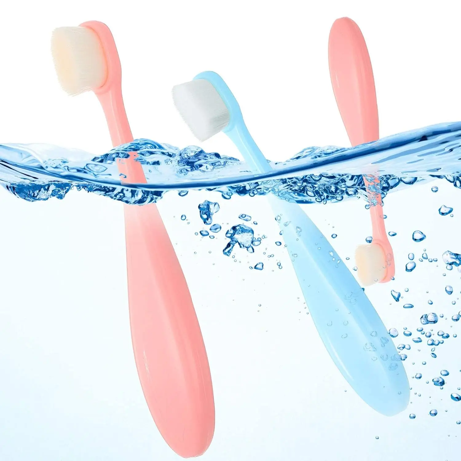 Four extra soft nano toothbrushes in blue and pink colors designed for toddlers and children for gentle and effective teeth cleaning.