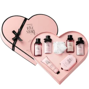 This Kimirica Love Story gift set features seven luxurious bath and body essentials, including bubble bath, body wash, lotion, bath salt, hand cream, bathing bar, and a loofah, all infused with romantic notes of gardenia and jasmine, beautifully packaged for gifting.