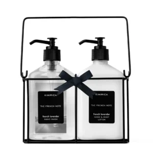 This Kimirica French Note hand wash and lotion gift set, infused with authentic French Lavender, includes a sleek black metal caddy, perfect as an elegant and luxurious sink accessory for any home.