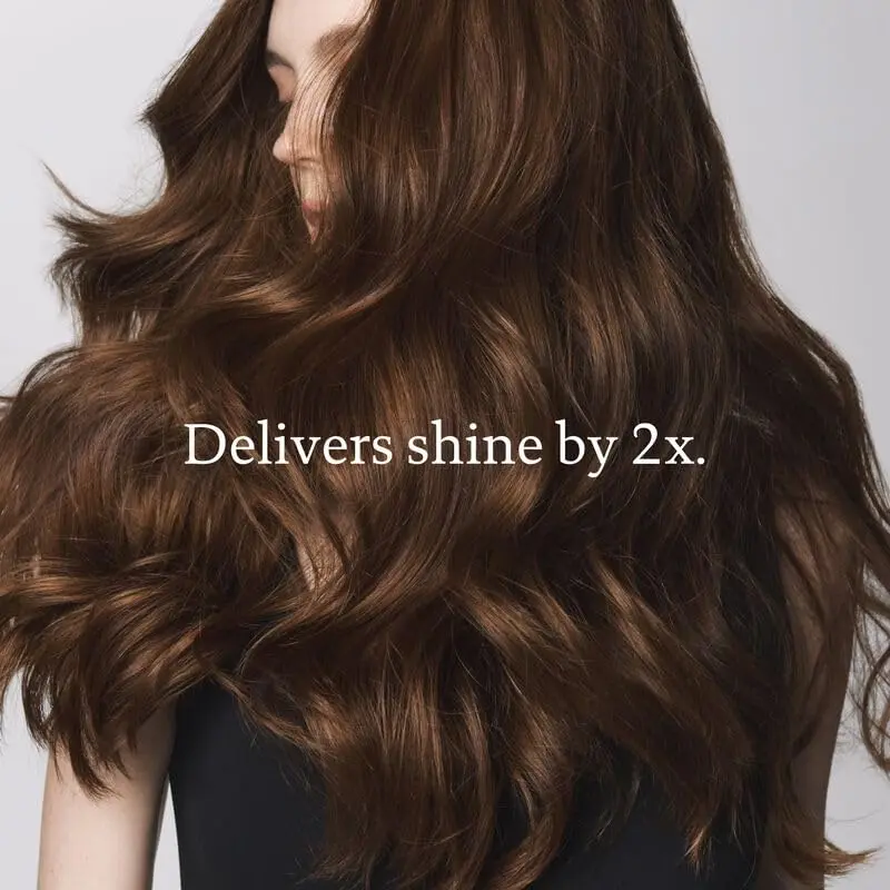 Living Proof curly hair kit with shampoo, conditioner, definer, and gloss to create shiny, healthy, defined curls with 90% frizz control.