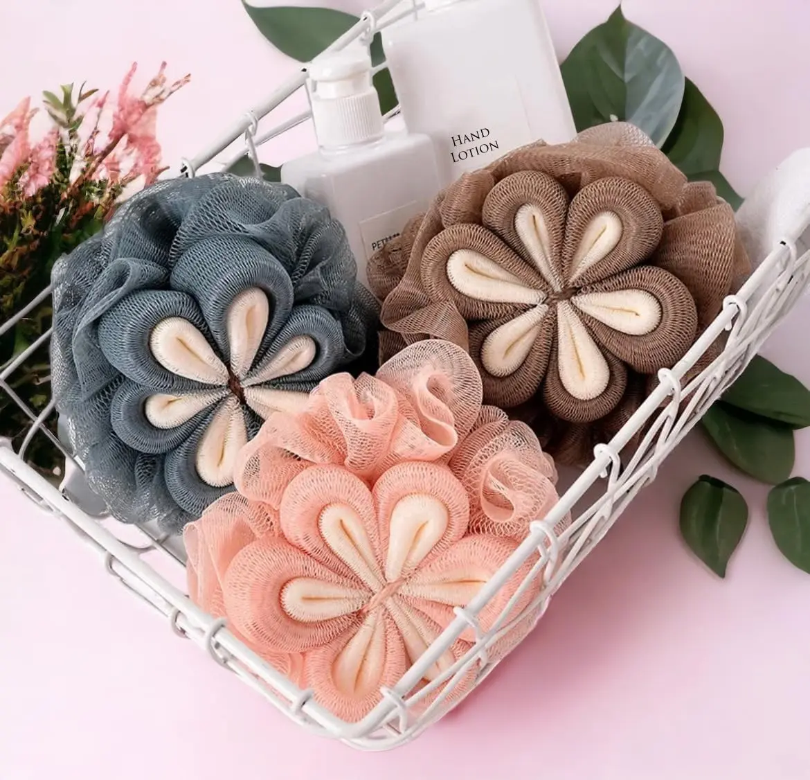 This is a 3 pack of MOMENT loofah bath sponges designed for exfoliating and cleansing the body, featuring soft mesh and long handles for easy use in the shower.