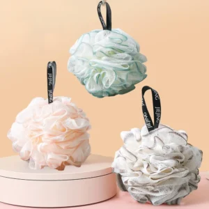 This image shows a three pack of colorful loofah sponges for shower and bath use.