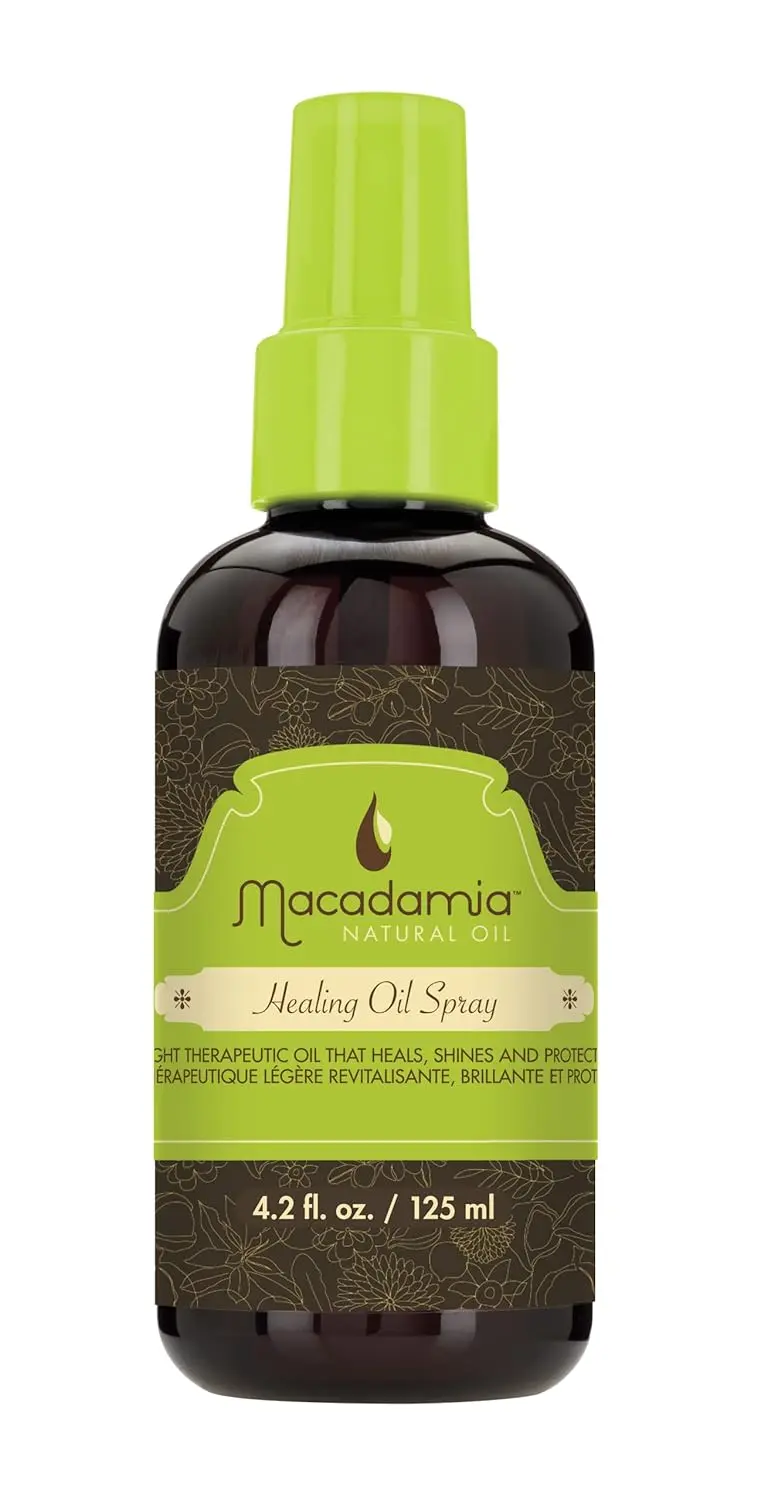A white bottle of Macadamia Healing Oil Spray designed to instantly hydrate, nourish, and replenish moisture for tangle and frizz-free hair after swimming.