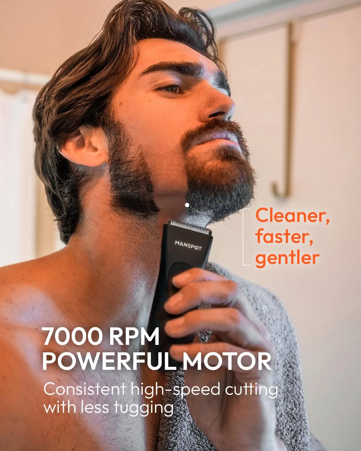 The MANSPOT electric body hair trimmer is displayed with its guards, designed for a smooth and safe grooming experience for men's groin and body hair.