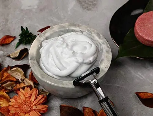 This light grey marble shaving bowl with micro-ridges helps create a rich lather with your favorite shaving soap or cream while maintaining water temperature.