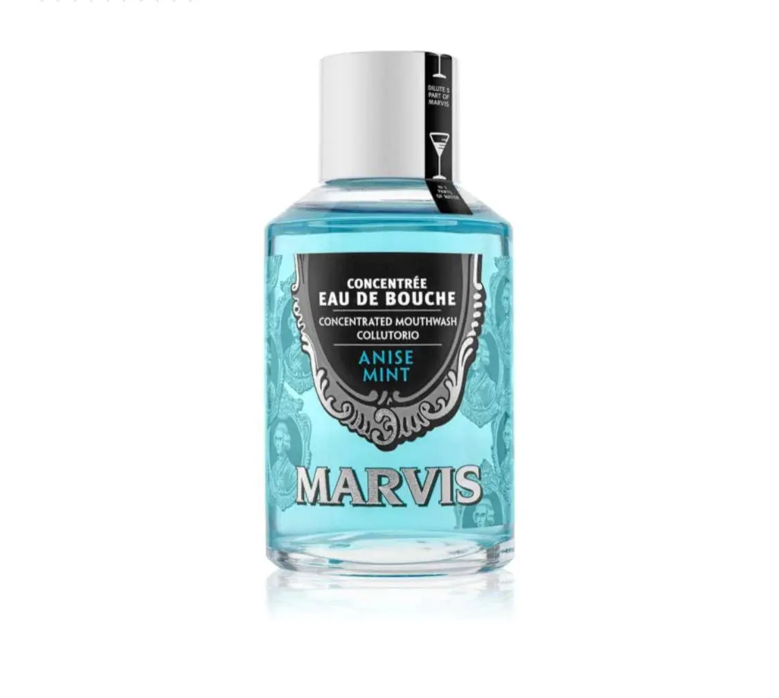 A bottle of Marvis Spearmint Mouthwash provides a super fresh breath, reduces plaque build-up, and promotes healthy oral hygiene with its refreshing peppermint and herb formula.