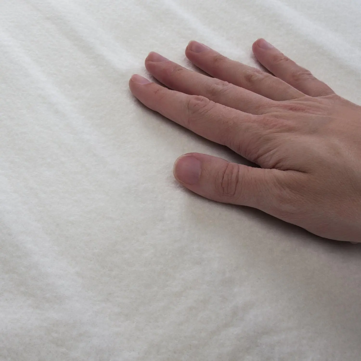 EARTHLITE massage table warmer with three heat settings and cozy felt lining, designed to fit full-sized massage tables, providing warmth and comfort.