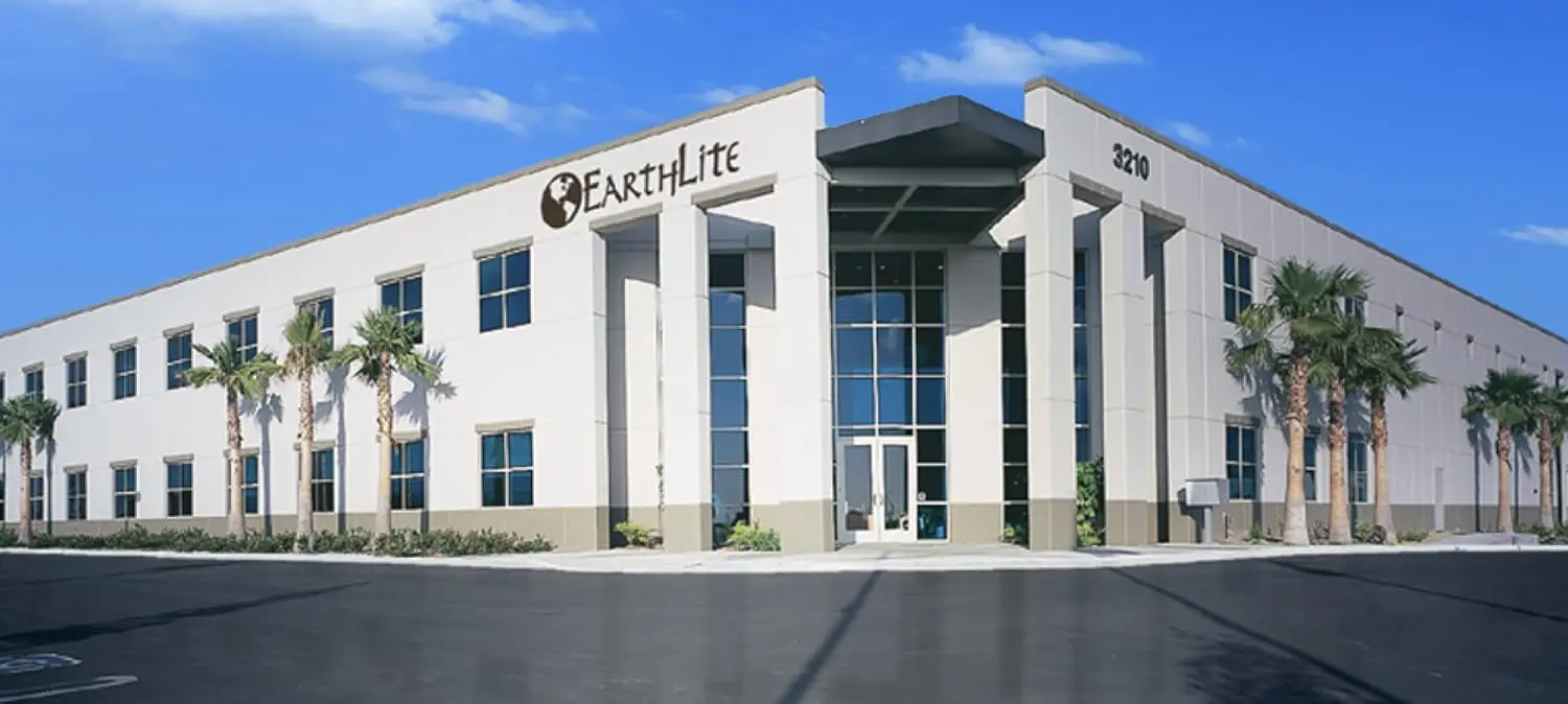 EARTHLITE massage table warmer with three heat settings and cozy felt lining, designed to fit full-sized massage tables, providing warmth and comfort.