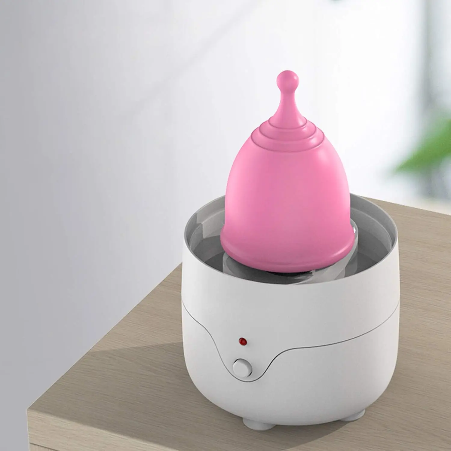 This portable menstrual cup cleaner machine provides an effortless way to clean and sanitize silicone period cups in about 3 minutes, offering a convenient alternative to boiling.